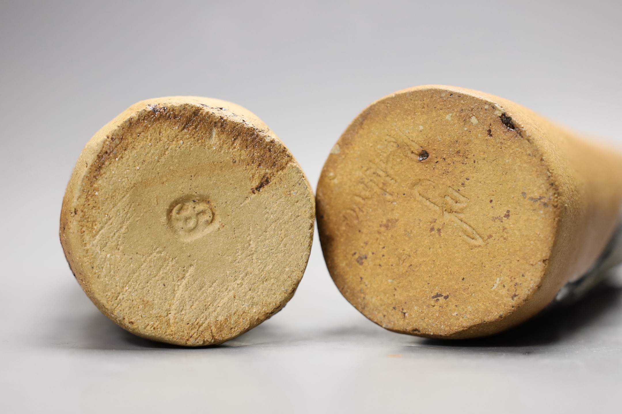 A pair of partially glazed stoneware cylindrical vases, circa 1970, 25cm high